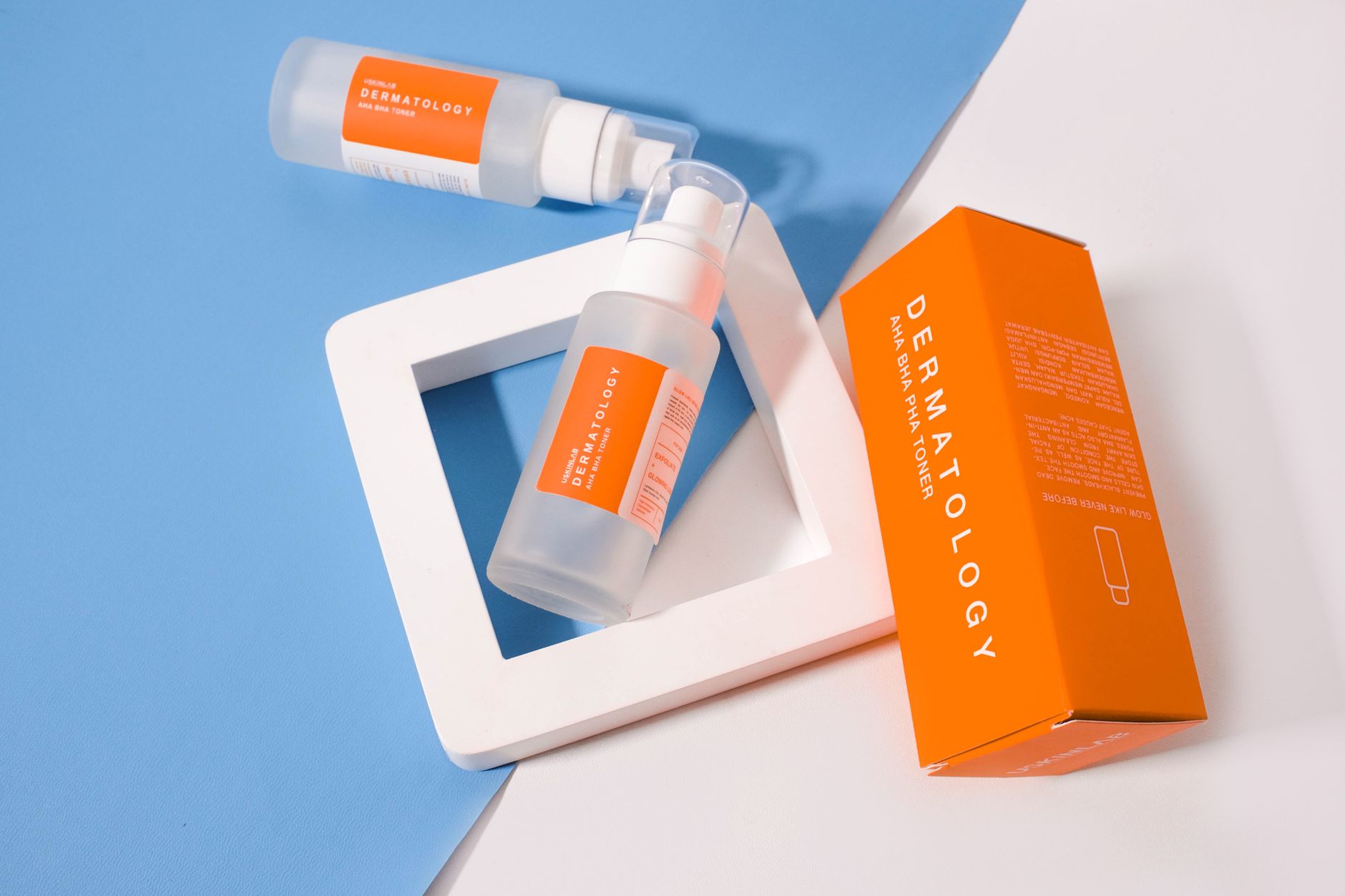 AHA and BHA product bottles with various fruits and plants representing their natural origins
